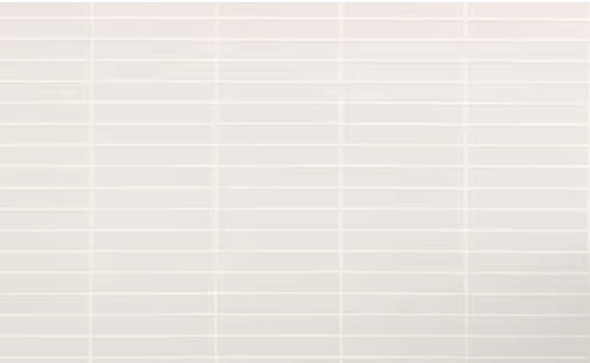 Pale linear tile selected for the primary shower floor at 5507 E Pinchot